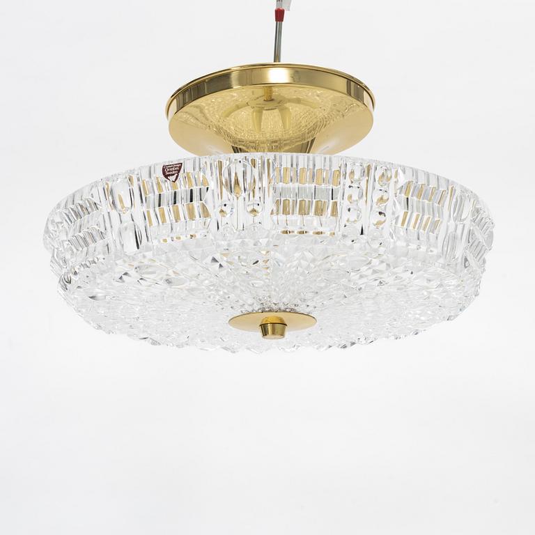 Carl Fagerlund, a glass and brass ceiling lamp, Orrefors, second half of the 20th century.