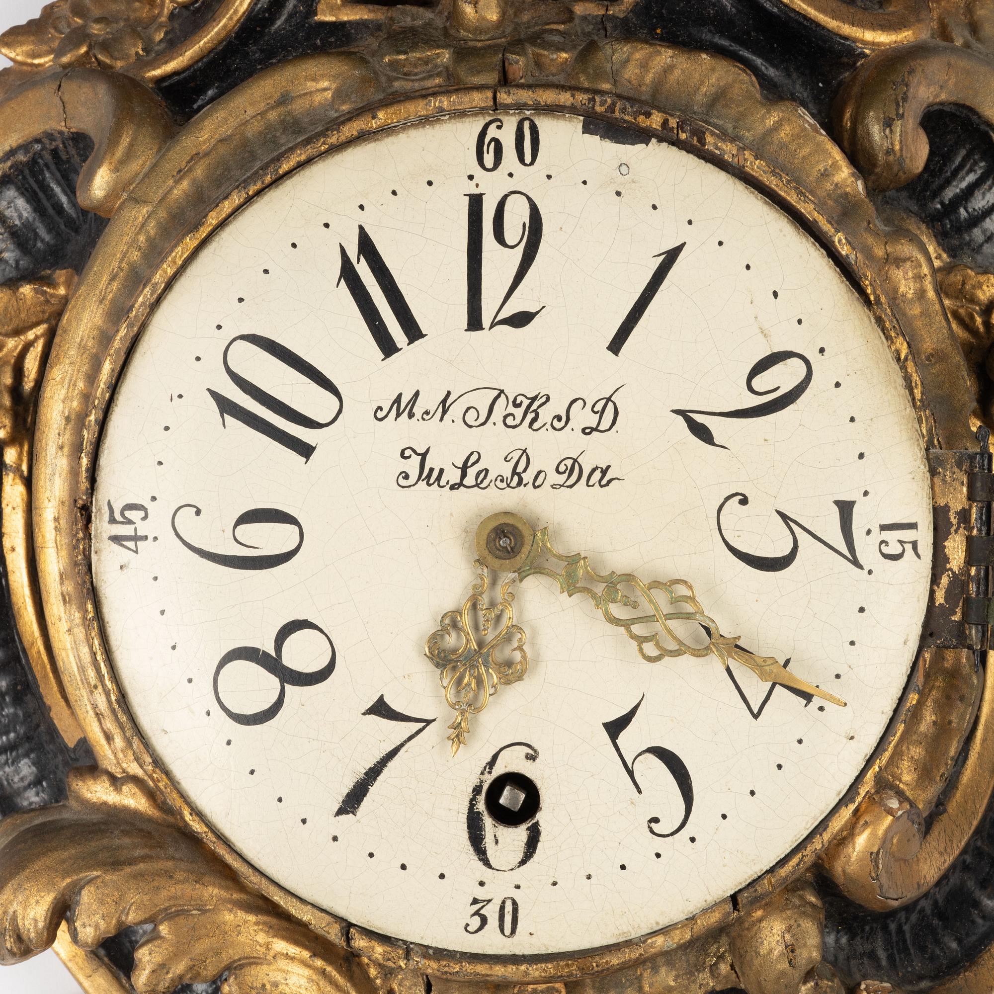 A Rococo wall clock, second half of the 18th Century.