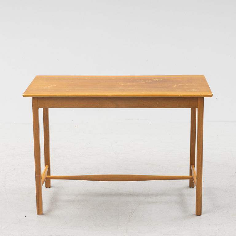 Josef Frank, a model 1106 walnut table, Firma Svenskt Tenn, Sweden.