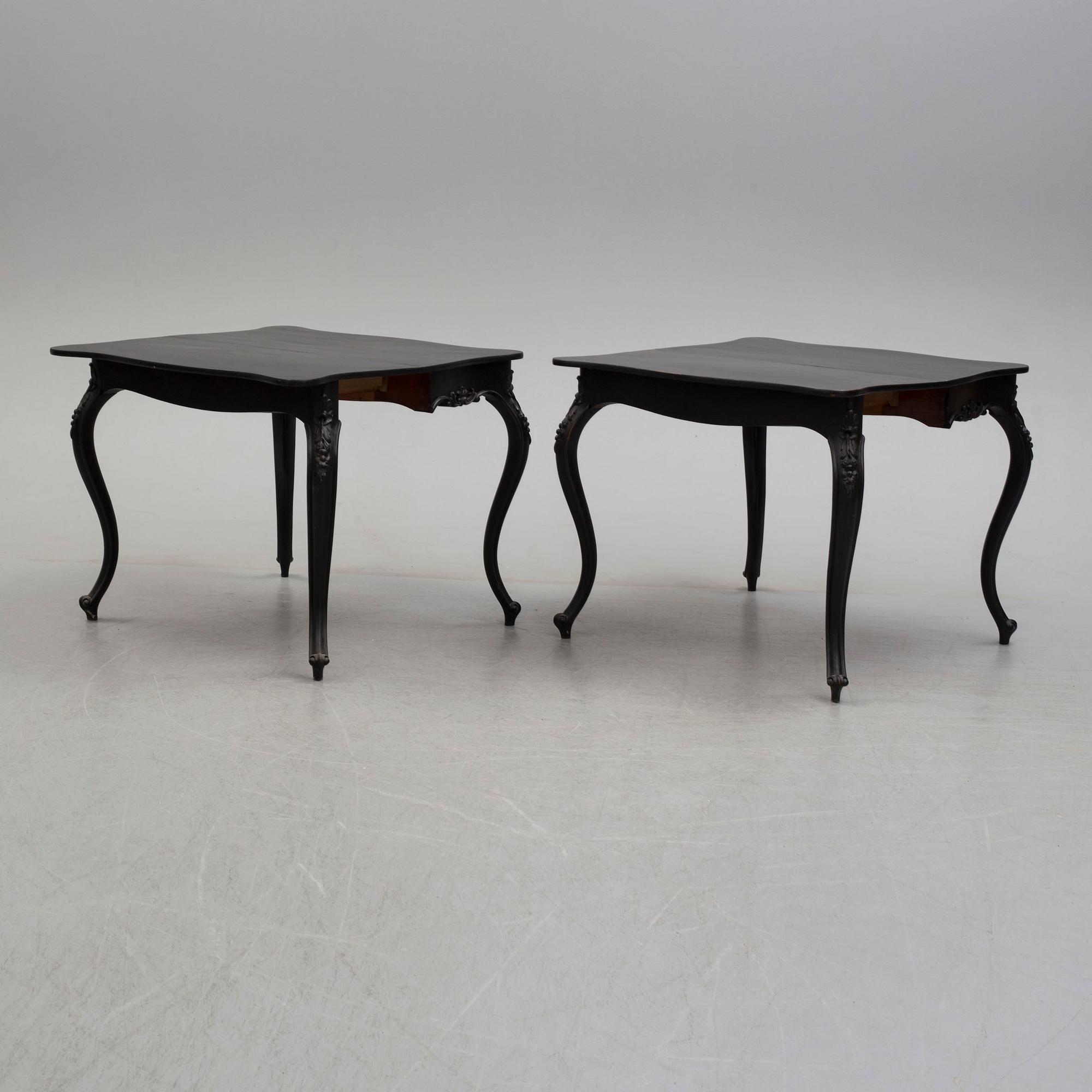 A pair of end of the 19th century new rococo style painted card tables.