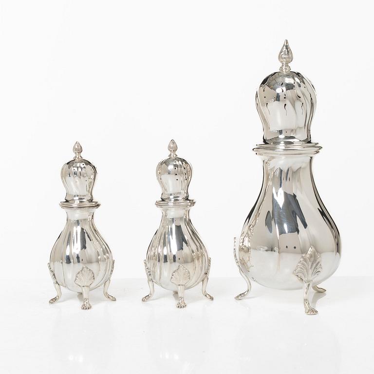 Sugar caster and salt and pepper shakers, silver, marked C.G. Hallberg, including Stockholm 1948.