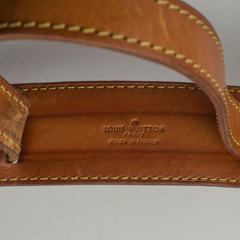 a Louis Vuitton "Jeune Fille" bag.
