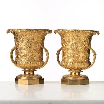 A pair of gilt bronze wine coolers, England, 1825-40.