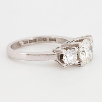 Brilliant-cut diamond  three-stone ring.