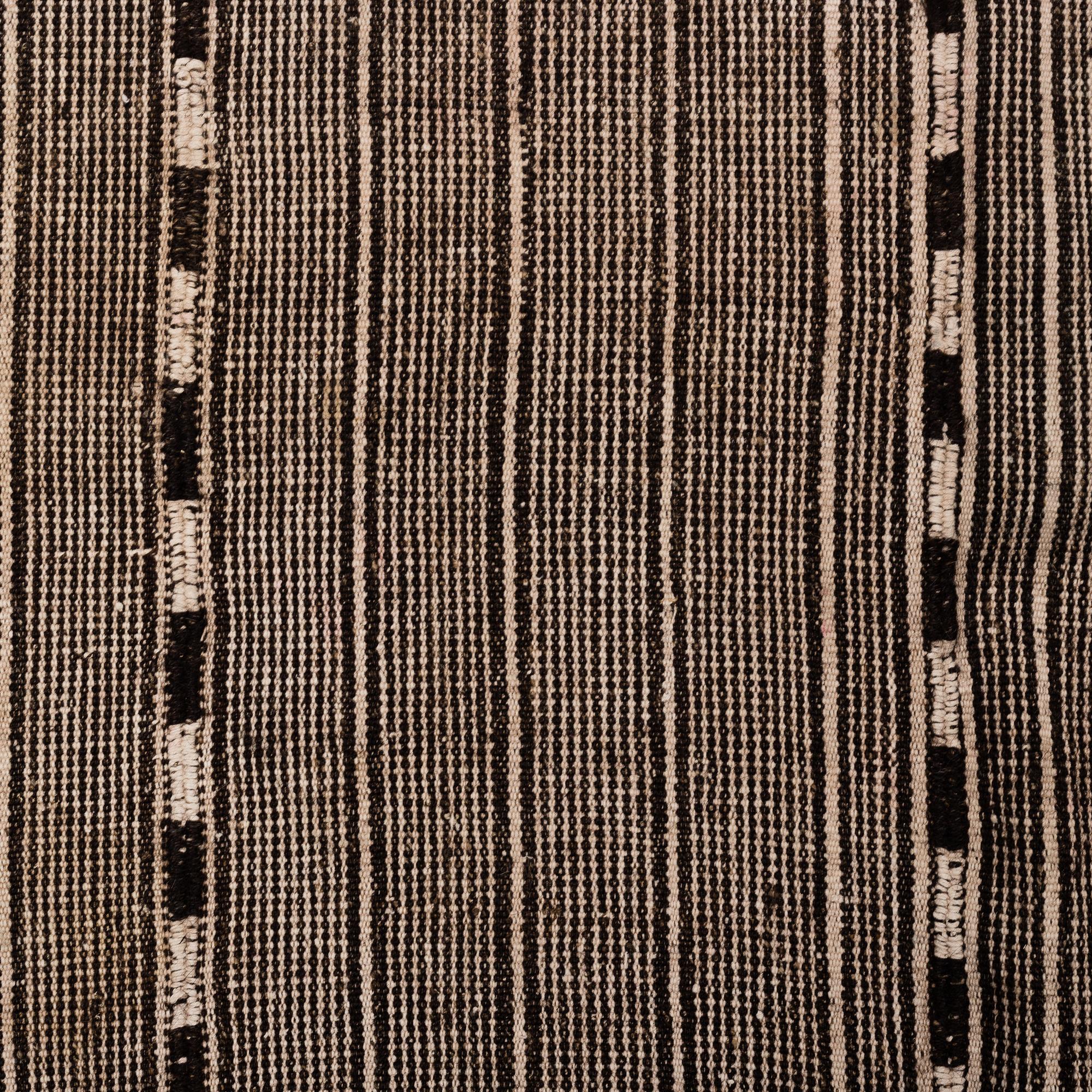 A CARPET, flat weave, around 274 x 150 cm.