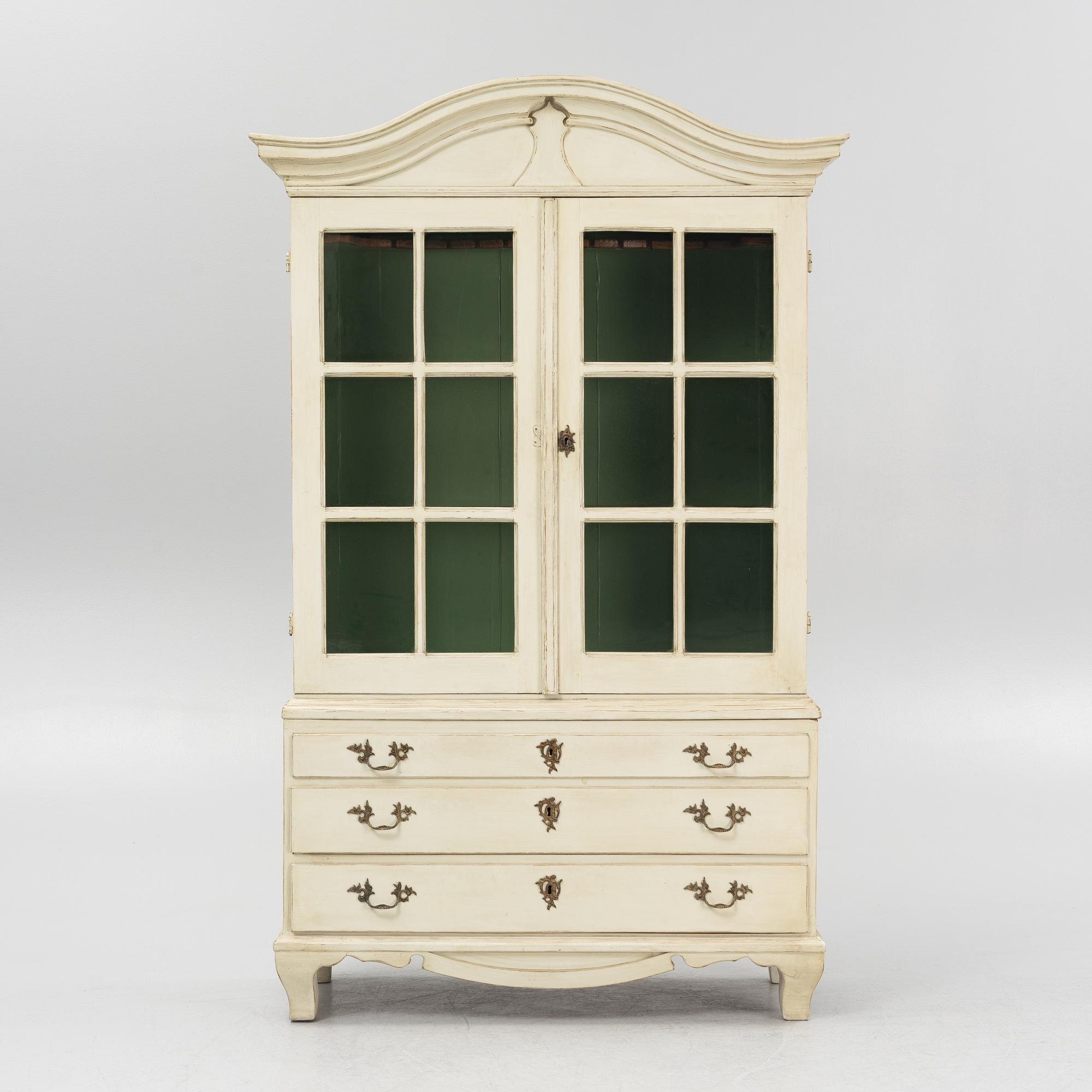 A Rococo style vitrine cabinet, 19th century.