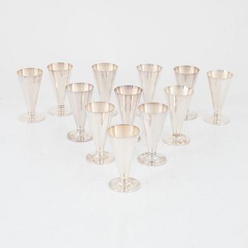 A group of twelve silver schnaps glasses , Tore Eldh, K&EC, Gothenburg, Sweden, 1949-1958.