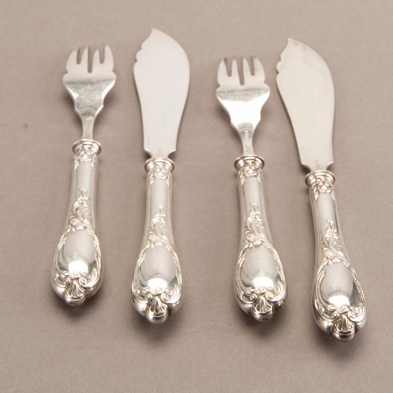 A German 20th century set of 12 fish cutlery low grade silver mark of F W Hespe hamburg early 1900s.