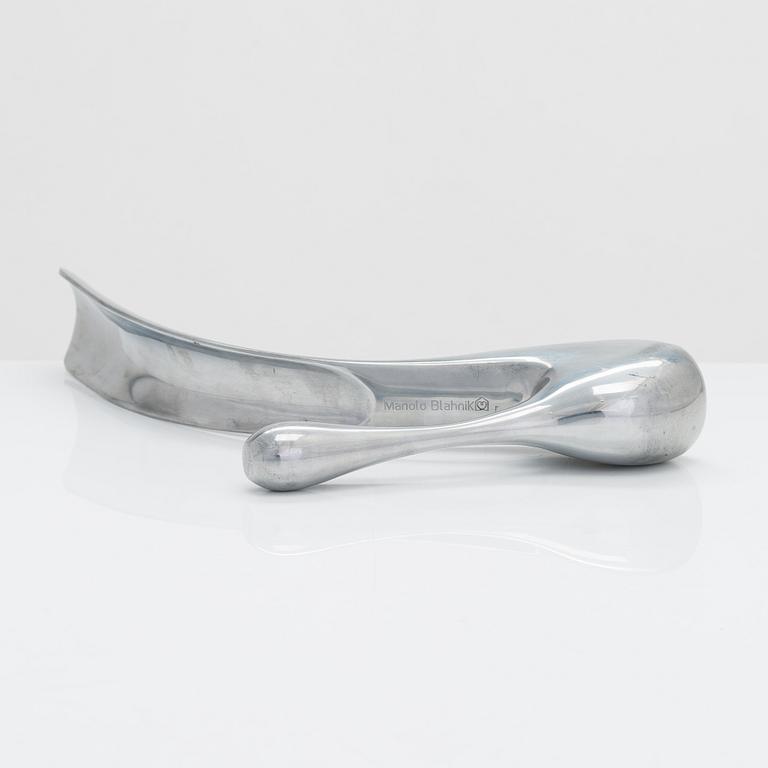 A metal shoe horn by Manolo Blahnik, 2000s.