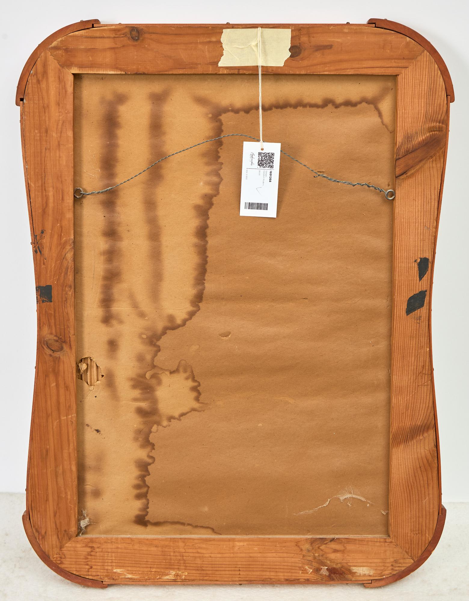 A 1940s Swedish Modern mirror.