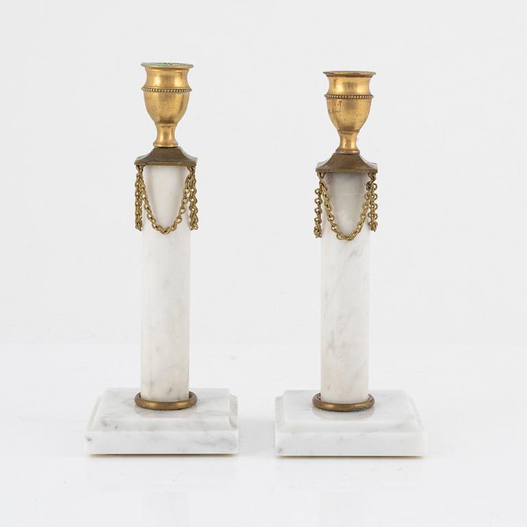 A pair of Gustavian style candlesticks, circa 1900.