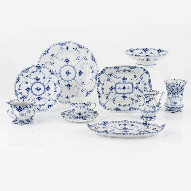 Royal Copenhagen, a 25-piece porcelain coffee service 'Musselmalet Full and Half Lace', Denmark.