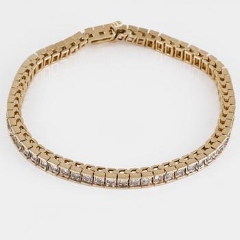 ARMLÄNK, 14K guld med briljantslipade diamanter ca 3.00 ct. Vikt 14,7 gram.