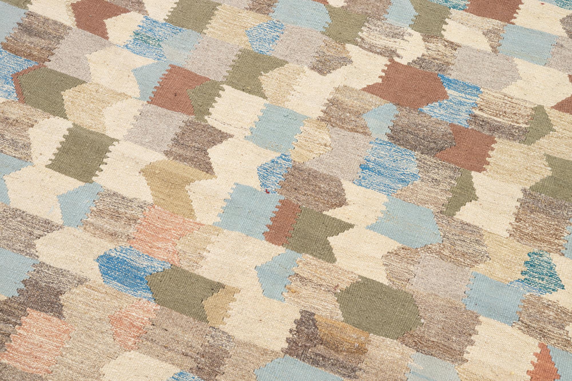 A Kelim carpet, 239 x 182 cm.