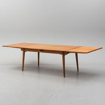 HANS J WEGNER, a model 'AT312' teak and oak dining table from Andreas Tuck, Denmark.