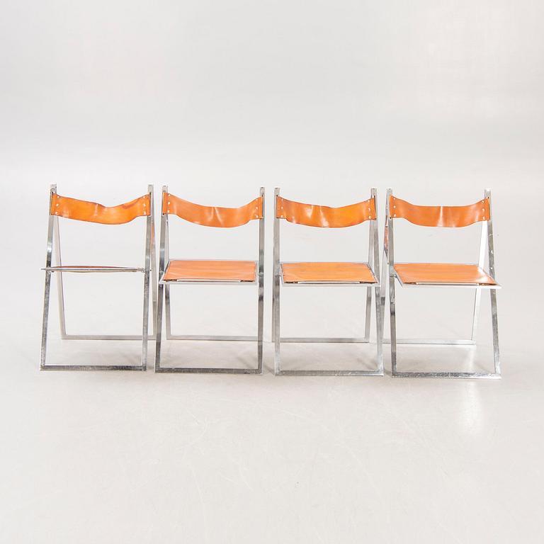 A set f four Fontoni & Geraci leather and chrome folding chairs