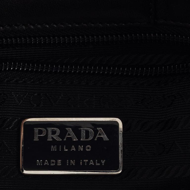 Prada, a black leather bag.