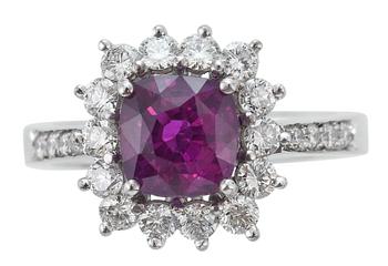 A RING, ruby c. 2.60 ct and diamonds c. 0.86 ct.