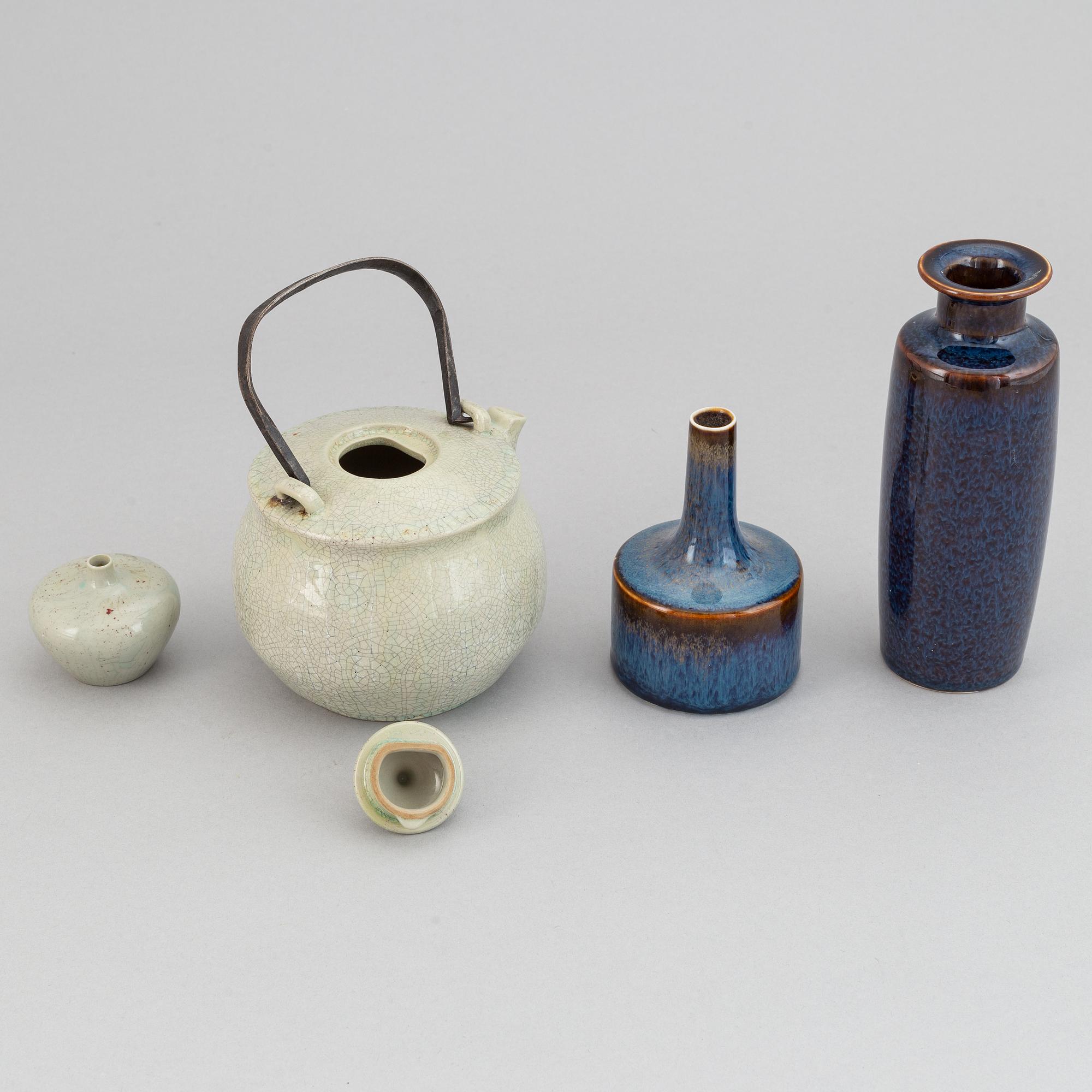Carl-Harry Stålhane, a stoneware teapot and a set of three vases, Rörstrand, second half of the 20th Century.