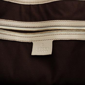 Gucci, leather bag.