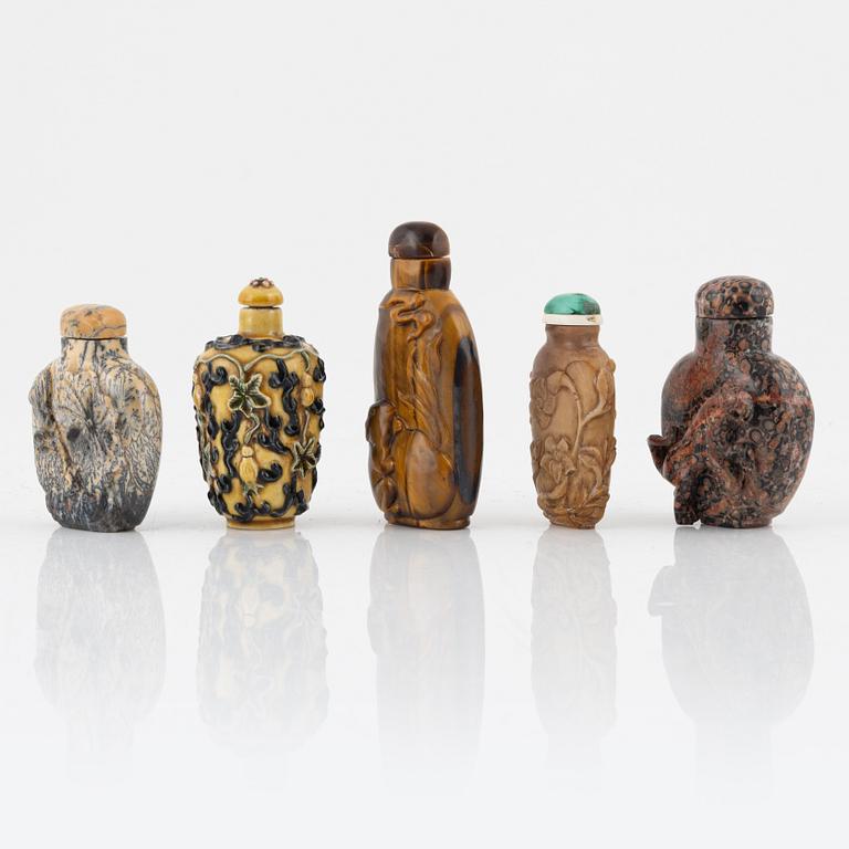 Ten snuff bottles, mottled stone, China, 20th century.