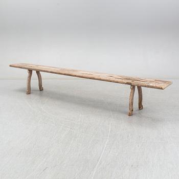 A pine bench, 19th Century.