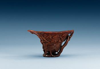 1503. A rhinoceros horn libation cup, Qing dynasty, Kangxi (1662-1722).