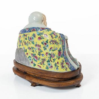 A Chinese famille rose porcelain figure of a Budai, around 1900.