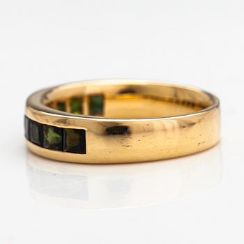 An 18K gold ring with tourmalines. Finland 2002.