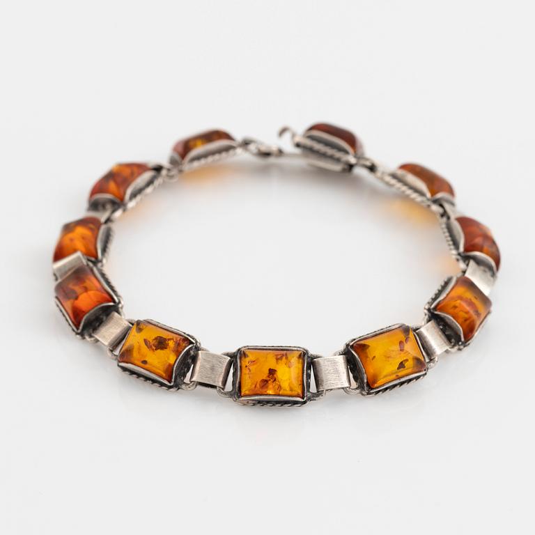 Silver and amber bracelet and earrings.