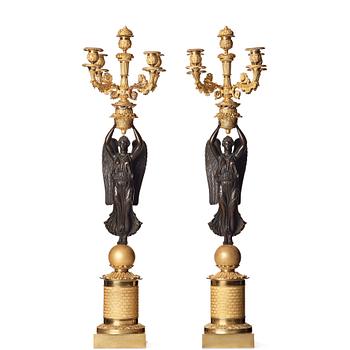 73. A pair of Empire early 19th century five-light candelabra by Pierre Chibout.