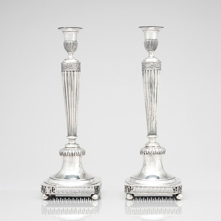 A pair of Swedish early 19th century silver candelsticks, mark of Jacob Hallardt, Stockholm 1811.