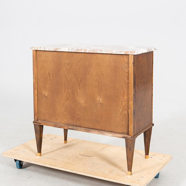 A Gustavian style mid 1900s mahogany dresser.