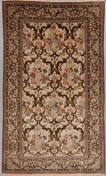 A silk Qum rug, around 220 x 134 cm.