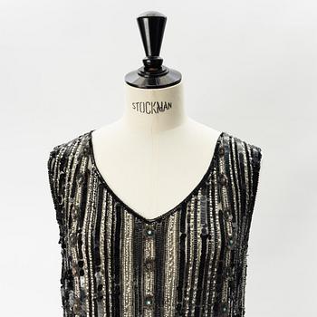 A sequin and pearl-embroidered 1920's dress.