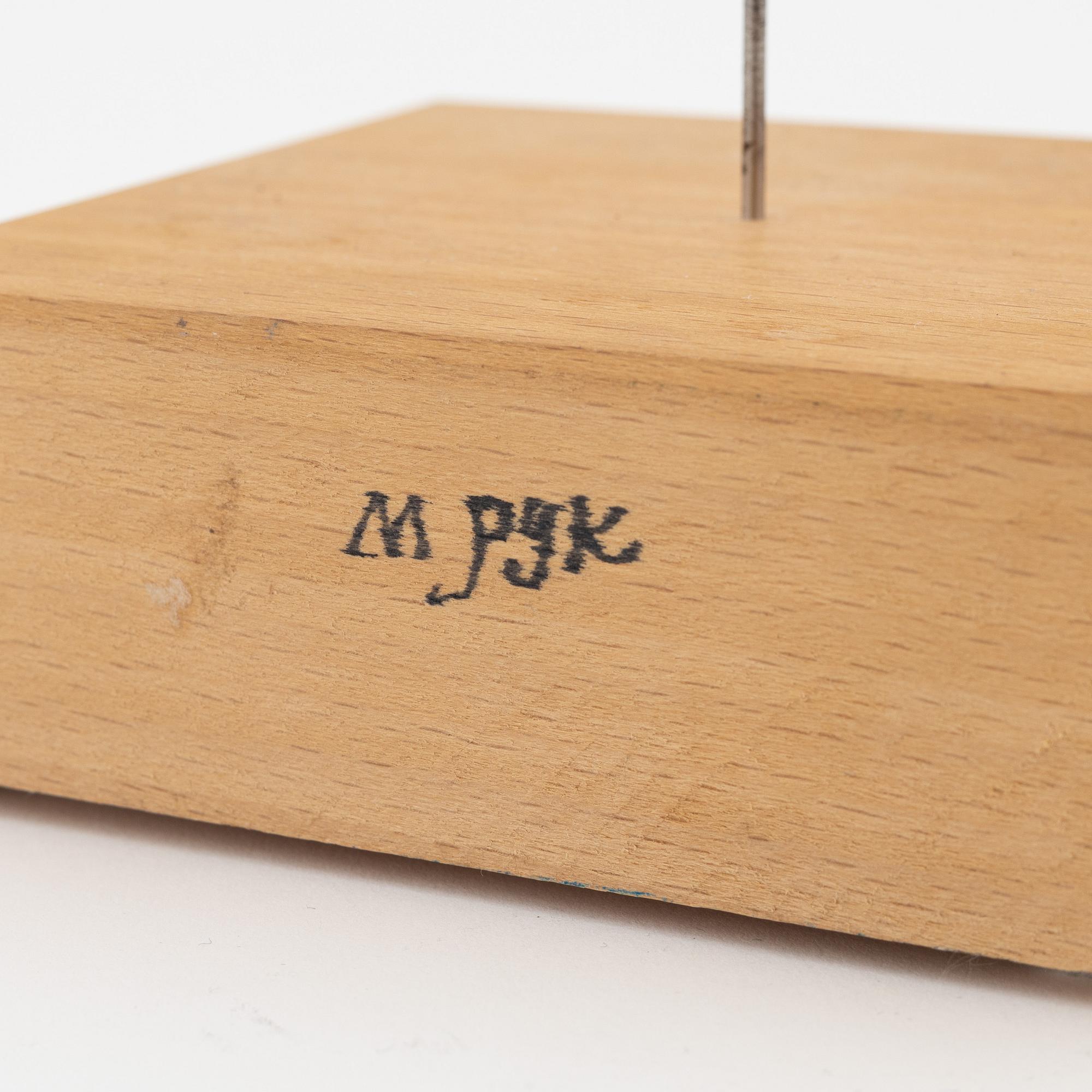 Madeleine Pyk, a painted wooden sculpture, signed.