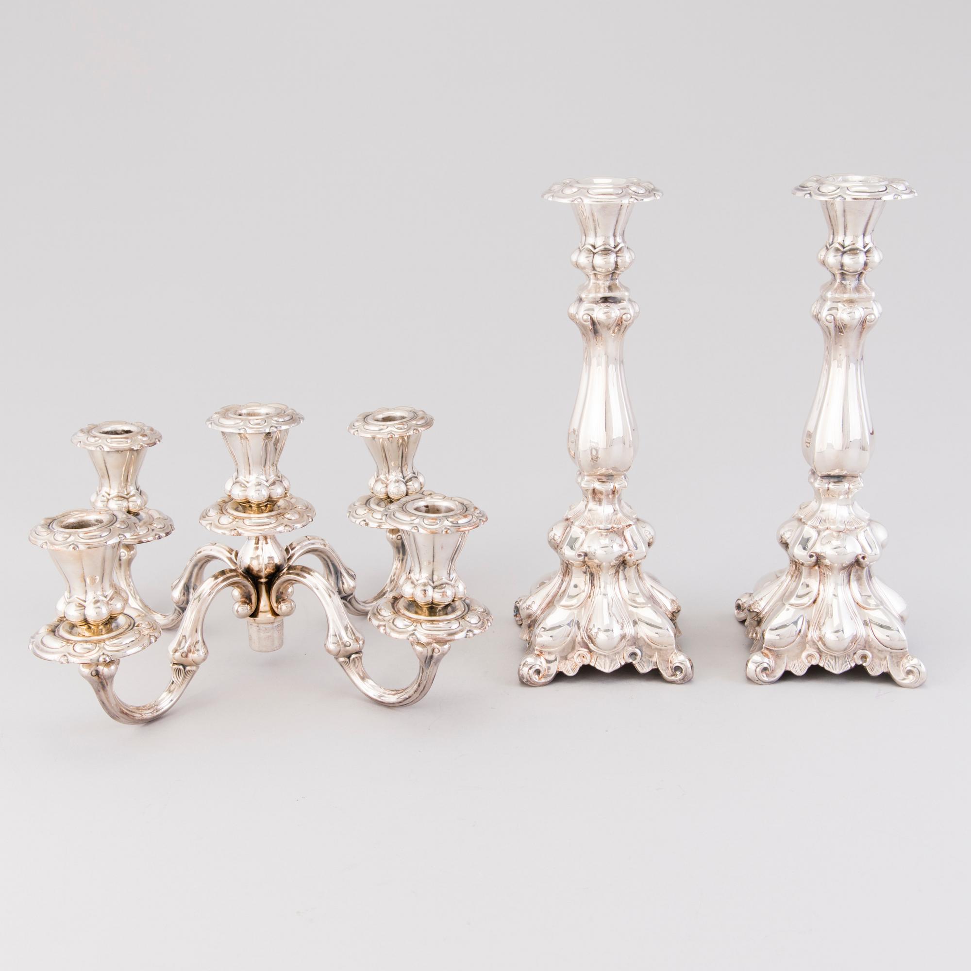 CANDELABRUM AND CANDLESTICK, silver, Kultakeskus Oy, Hämeenlinna, 1965 and 1975.