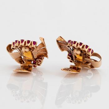 A pair of 18K gold earrings set with faceted citrine and rubies.