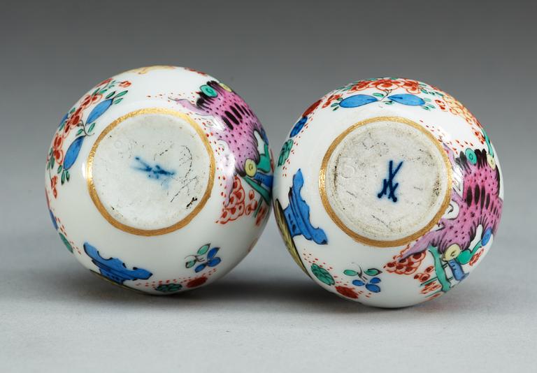 A pair of Meissen miniature vases, 19th Century.