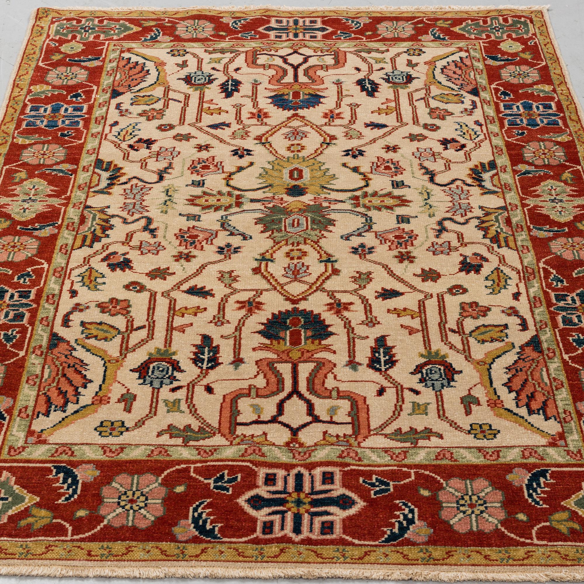 A RUG, Ushak design, ca 184 x 123 cm.