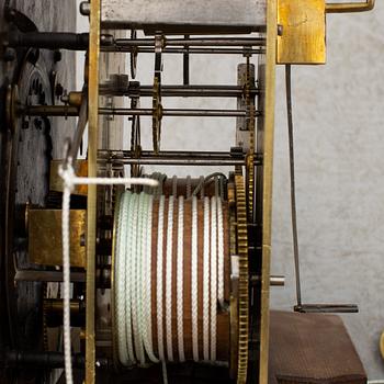 A 18th century long case clock.