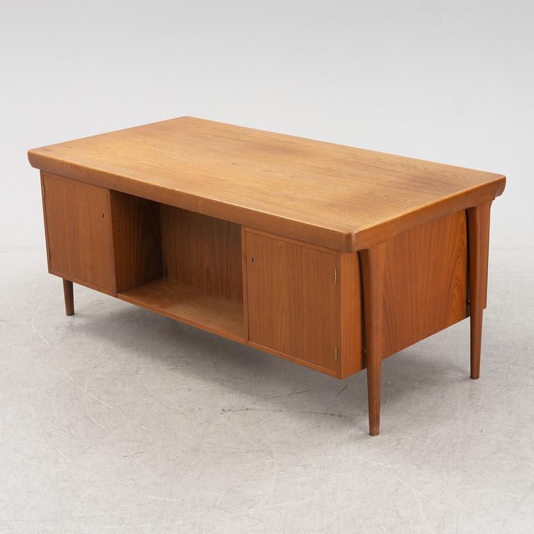 A teak 1950's/60's writing desk.