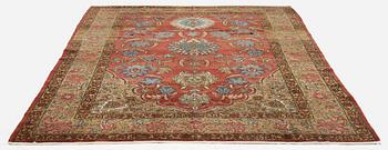 A Qum carpet, Central Persia, c. 310 x 190 cm.