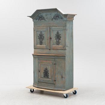 A Swedish painted cabinet, dated 1804.