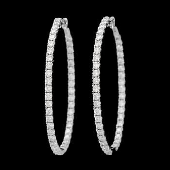 115. A pair of brilliant-cut diamond hoop earrings. Total carat weight circa 5.63 cts.