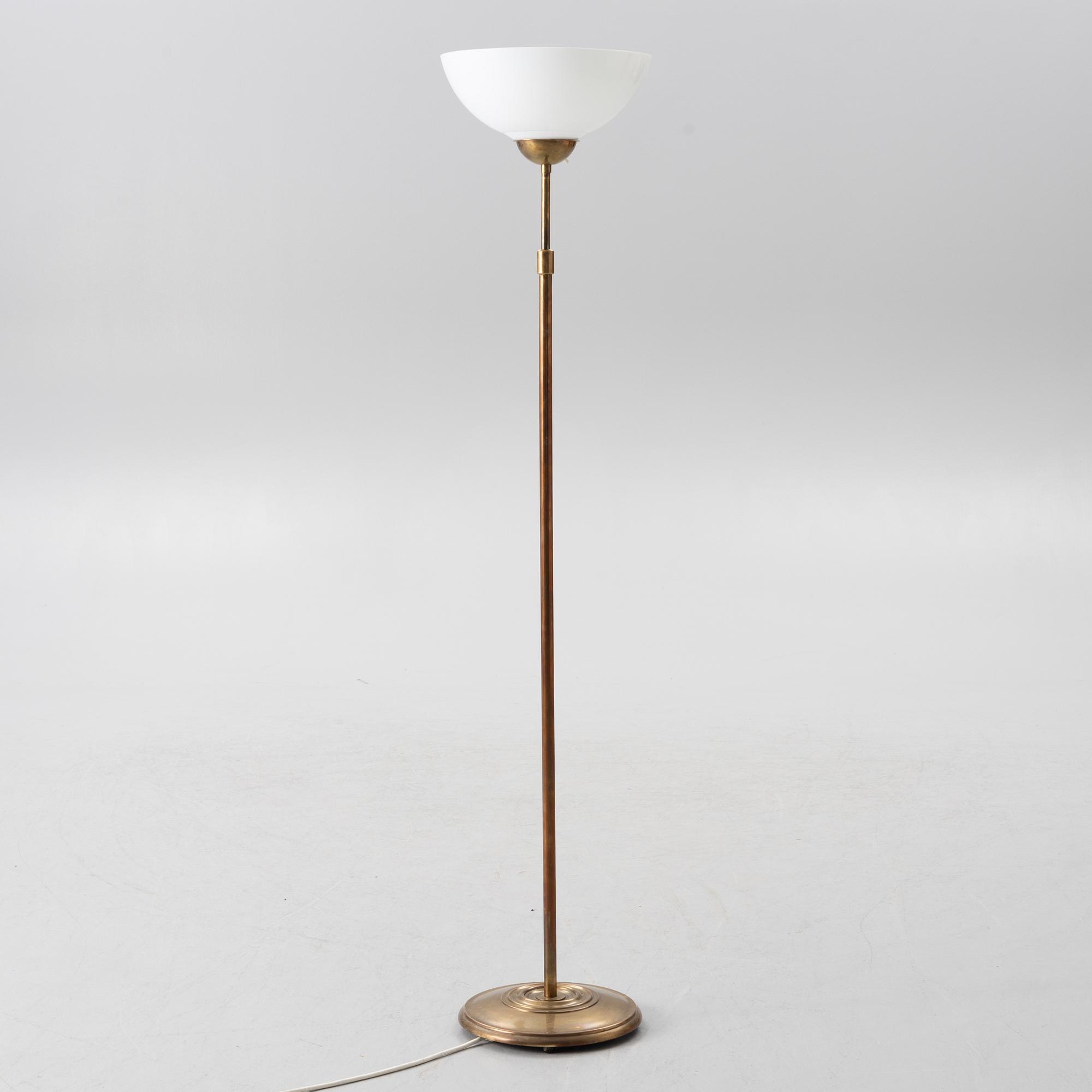 A brass floor lamp, Sweden, mid 20th century.