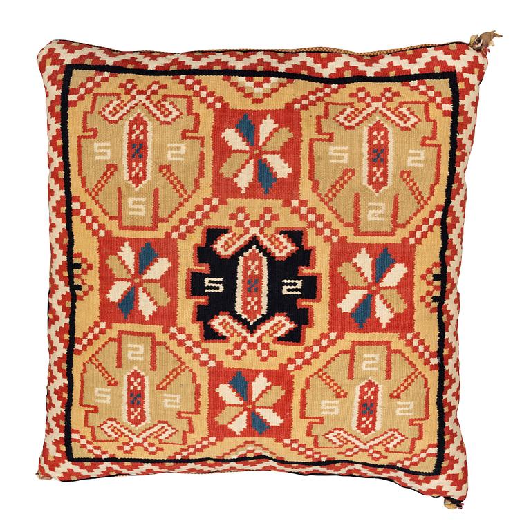 A double-interlocked tapestry cushion, ca 55 x 52,5 cm, Scania, 19th century.