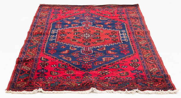 A carpet, circa 201 x 134 cm.