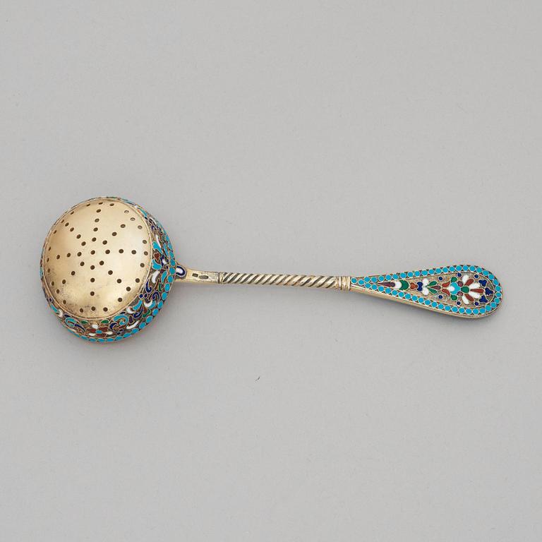 A Russian early 20th century silver-gilt and enamel cane-spoon, unidentified makers mark Moscow 1899-1908.