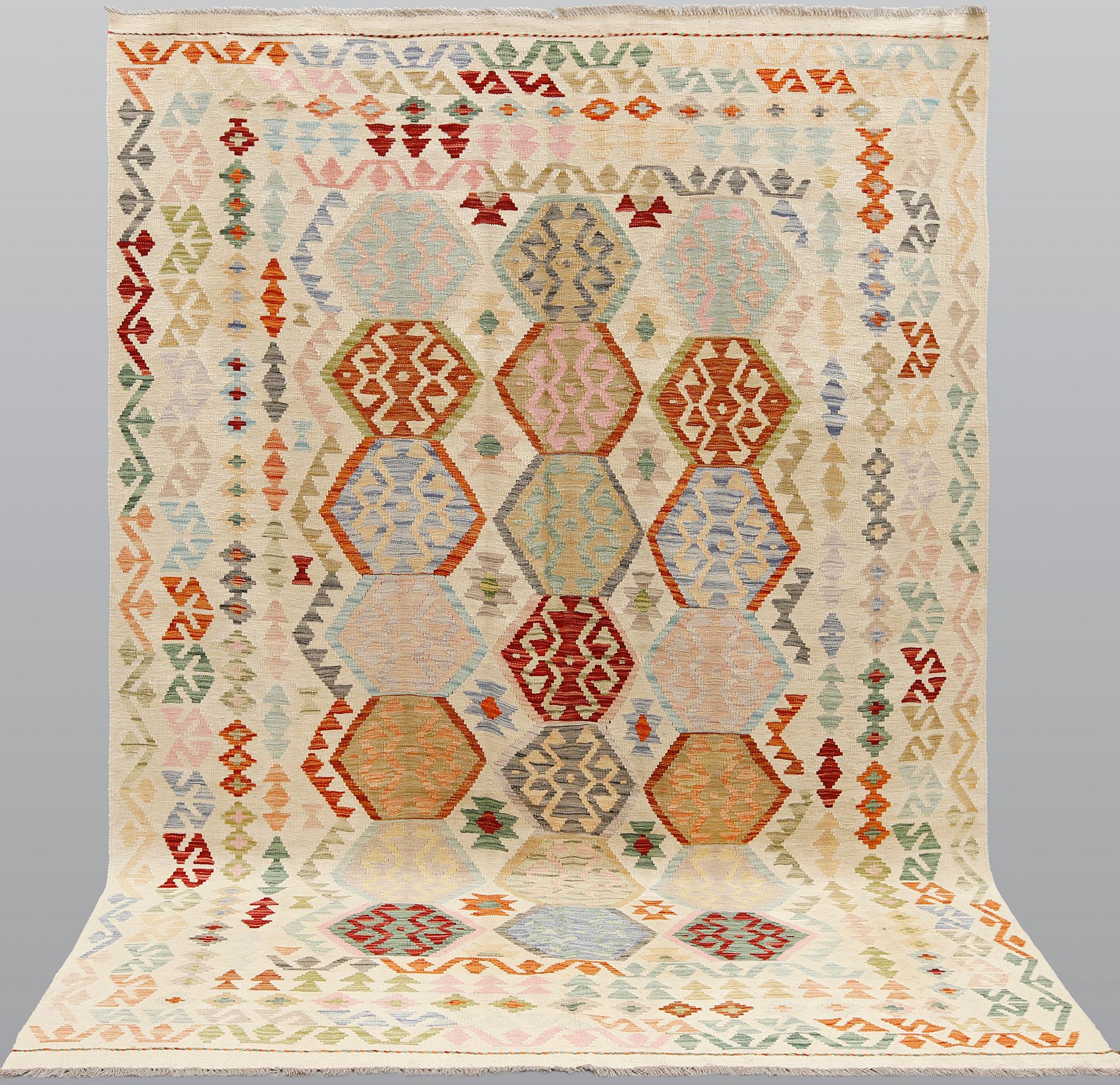 A Kilim carpet, ca 298 x 205 cm.